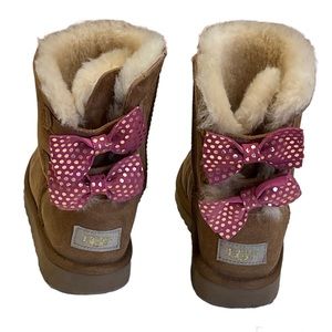 Girls UGGs with pink and gold leather bows